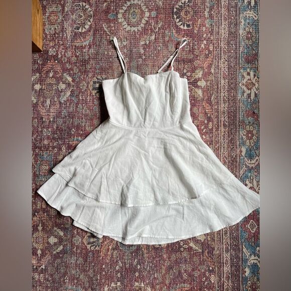 HALARA Dresses & Skirts - Women’s large HALARA white tie back bow tiered mini dress